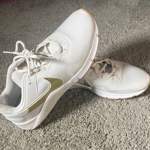 Nike Women's White and Gold Accent Sneakers